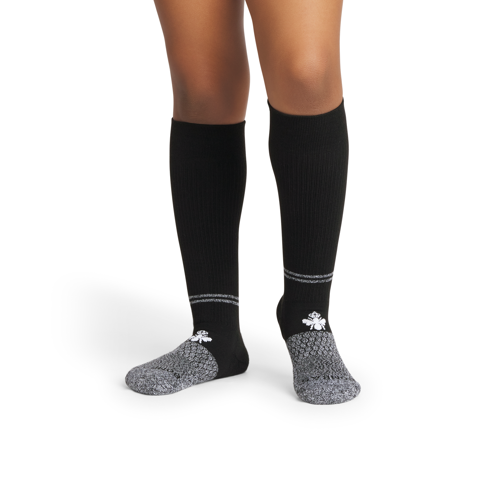 official-bombas::10479-black-youth-unisex-onmodel-2-transparent.png