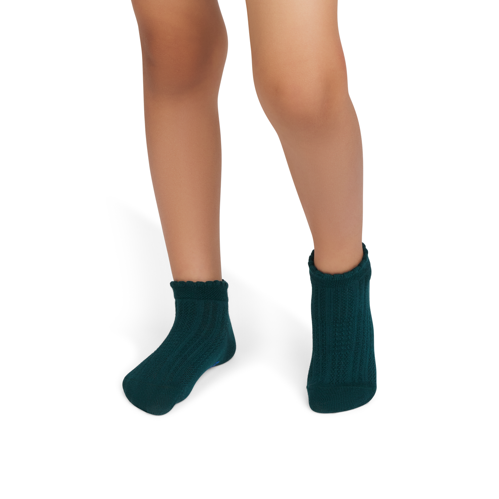 official-bombas::9733-tealpine-junior-unisex-onmodel-2-transparent.png