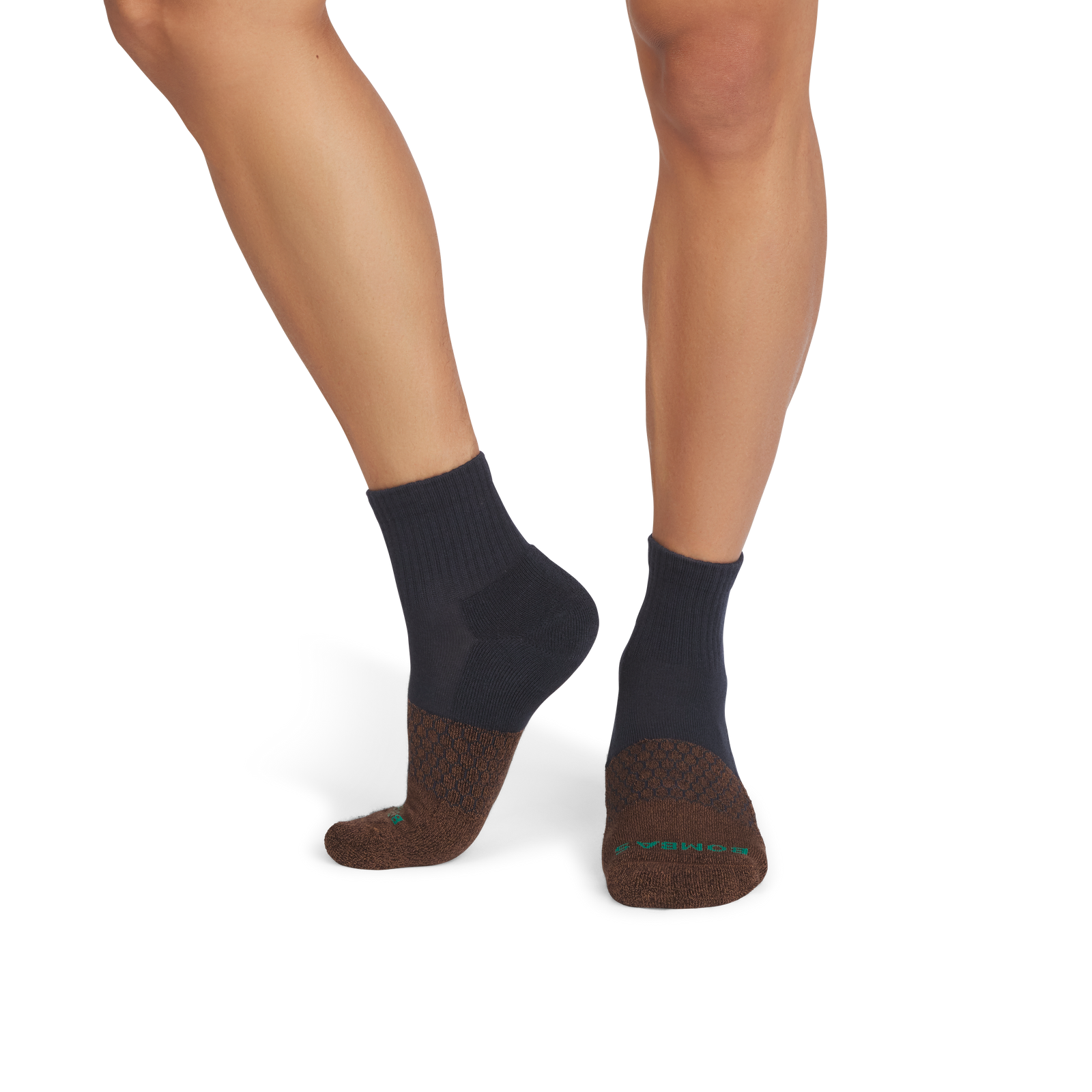official-bombas::9815-darkespresso-midnightnavy-adult-male-onmodel-2-transparent.png